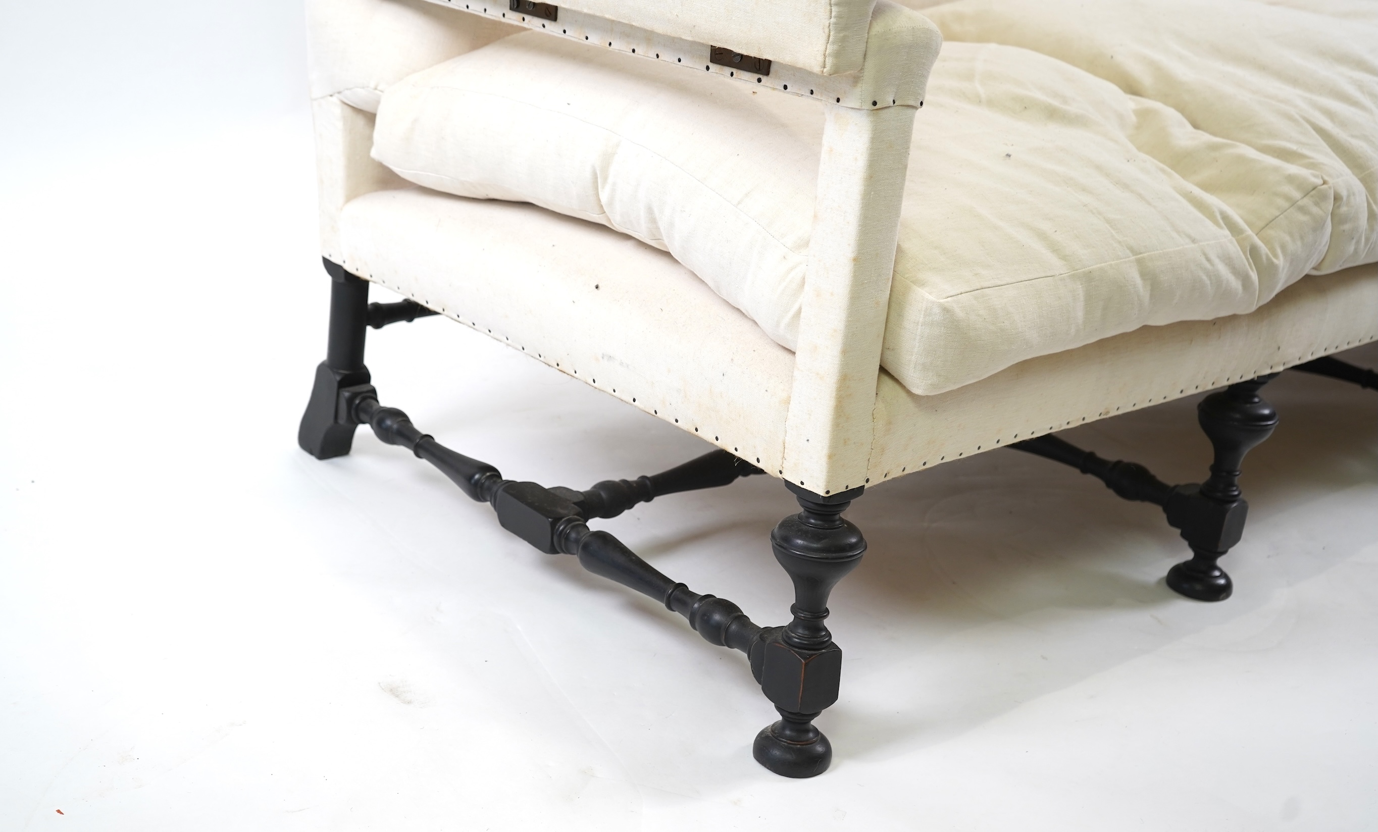 A Jacobean revival Knowle type three seater sofa